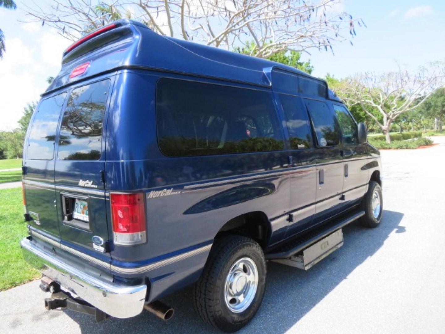 2011 Dark Blue /Gray Ford E-Series Wagon E-350 XLT Super Duty (1FBNE3BS4BD) with an 6.8L V10 SOHC 20V engine, located at 4301 Oak Circle #19, Boca Raton, FL, 33431, (954) 561-2499, 26.388861, -80.084038 - You are looking at a Gorgeous 2011 Ford Econoline E350 XLT Norcal Max High Top Handicap Wheelchair Conversion Van with 6.8L V10, 15K Original Miles, 9 Inch Lowered Floor, Braun UVL Side Entry Wheelchair Lift, Remote Control Power Side Entry Doors, Expanded Side Entry Doors, Q Straint Tie Down, Syste - Photo#25